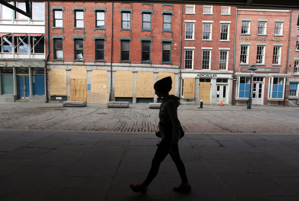 A stretch of Front Street in the South Street Seaport area, a part of Lower Manhattan that continues to suffer from the effects of Hurricane Sandy.  (Suzanne DeChillo/The New York Times)